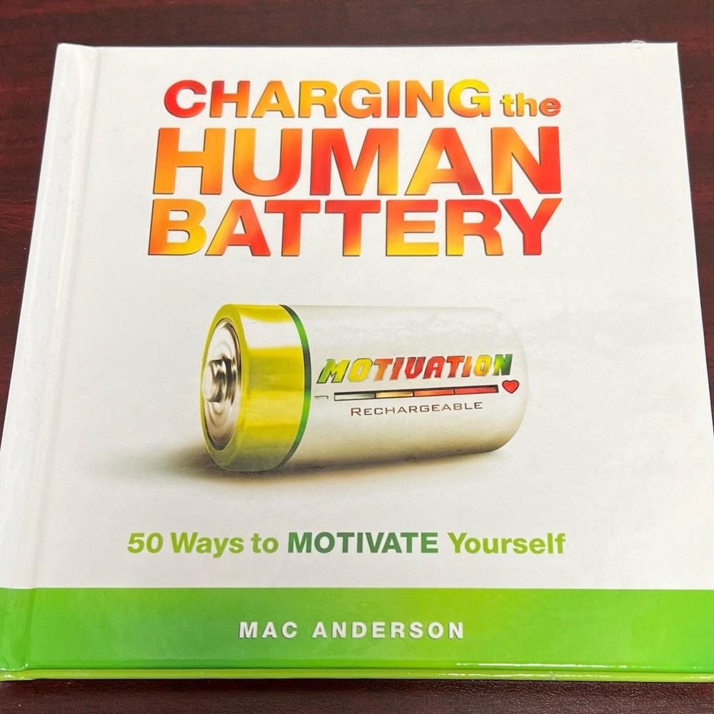 Charging the Human Battery motivational book by Mac Anderson.